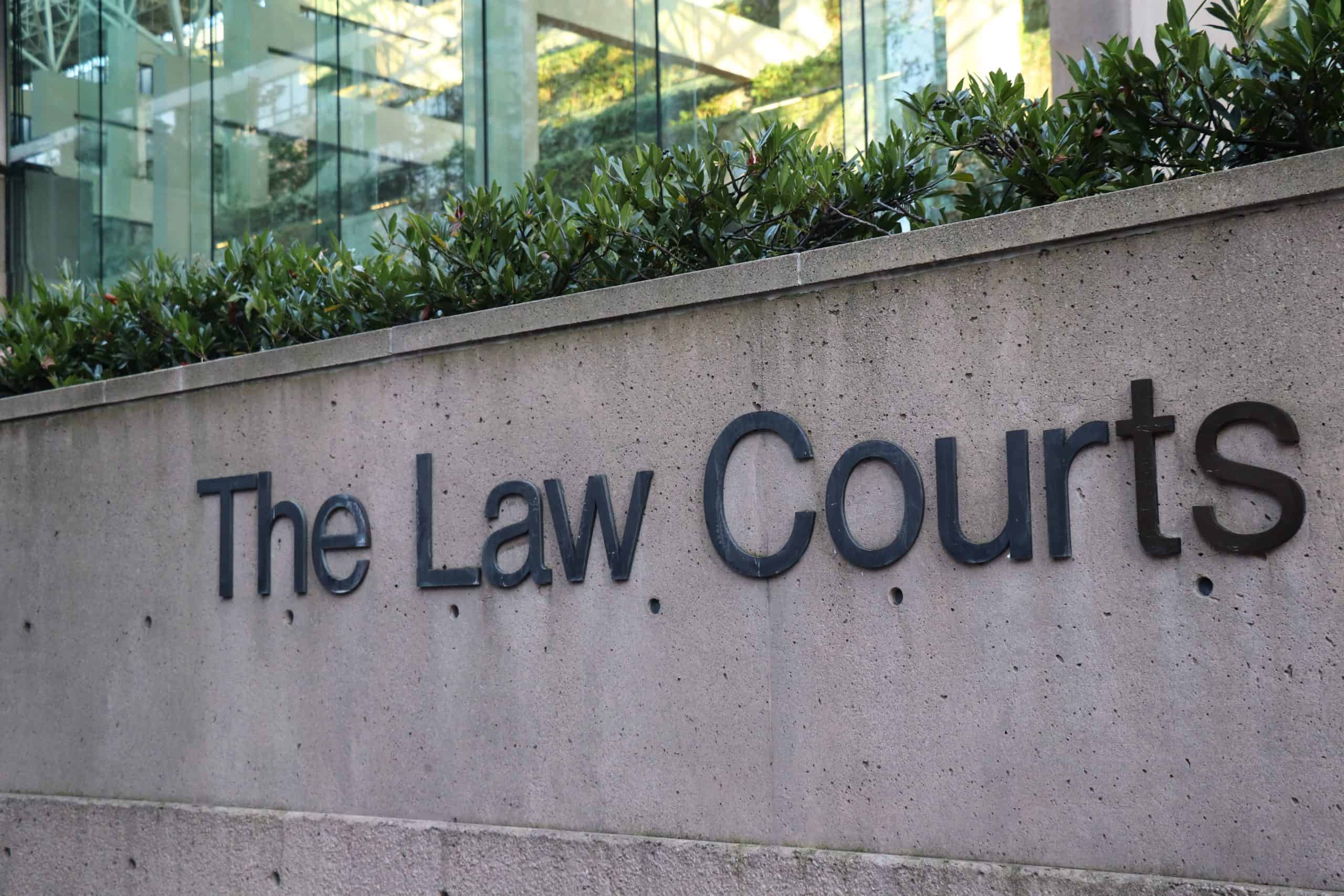 sign outside of vancouver law courts reads the law courts